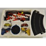 Scalextric - a Rovex Mini racing set, Mini Cooper G7 cars in red and yellow, assorted track,