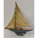 A wooden Pond Yacht, named Colin, blue keel, wooden deck, metal fin and weight, 73cm long,