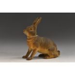 A late 19th century German papier mache candy box, modelled as a Hare, front raised, head up alert,