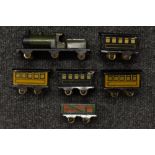 Toys - a miniature tinplate carpet train, six wheel engine, G.N.