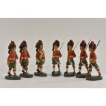 Elastolin - a seven piece Highlanders parade troop,