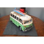 A reproduction tinplate surf camper