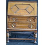 A 1940's style oak bureau