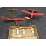A hand made balsa wood and paper rubber band powered flying model aircraft,