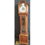 A reproduction mahogany longcase clock,