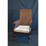 A Victorian mahogany bergère library chair, c.