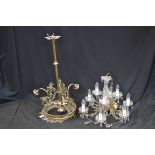 A Regency style brass four light ceiling lamp, decorated with stylized Phoenixes; a six branch,