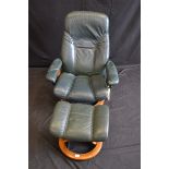 An Ekornes reclining armchair,