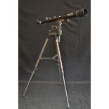 A Celestron Astro Master 70 telescope with tripod stand