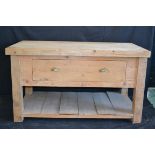 A large butcher's block, large top, pine base, deep drawer to frieze, plank undertier.