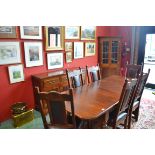 Thomas Hotchkiss - a dining room suite, comprising an oak extending dining table,