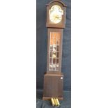 An oak cased triple weight longcase clock