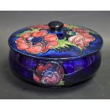 A Moorcroft Anemone pattern bowl and cover