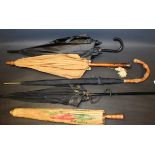 A Victorian black parasol, bamboo handle, c.