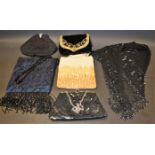 An Art Deco style lady's evening bag, ruched heart shaped panel; a black velvet evening purse,