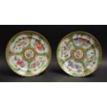A pair of 19th century Chinese Famille Rose plates, decorated with birds,