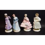 A set of four Royal Worcester figures,