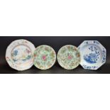 A pair of Chinese Famille Rose plates; an octagonal blue and white plate; another,