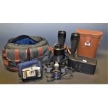 Photographic Equipment - a Yashica SLR camera; a Canon camera; a Tamron Adaptall lens in case;