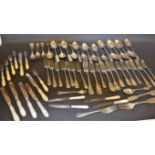 A set of six pairs of Victorian silver dessert knives and forks, mother of pearl hafts,