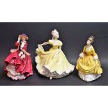 A Royal Doulton figure, HN 2307 Coralie; others, HN 1834 Top O' The Hill,