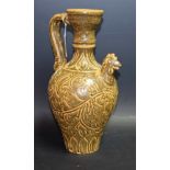 A Portuguese style single handled vase, sgraffito decoration,