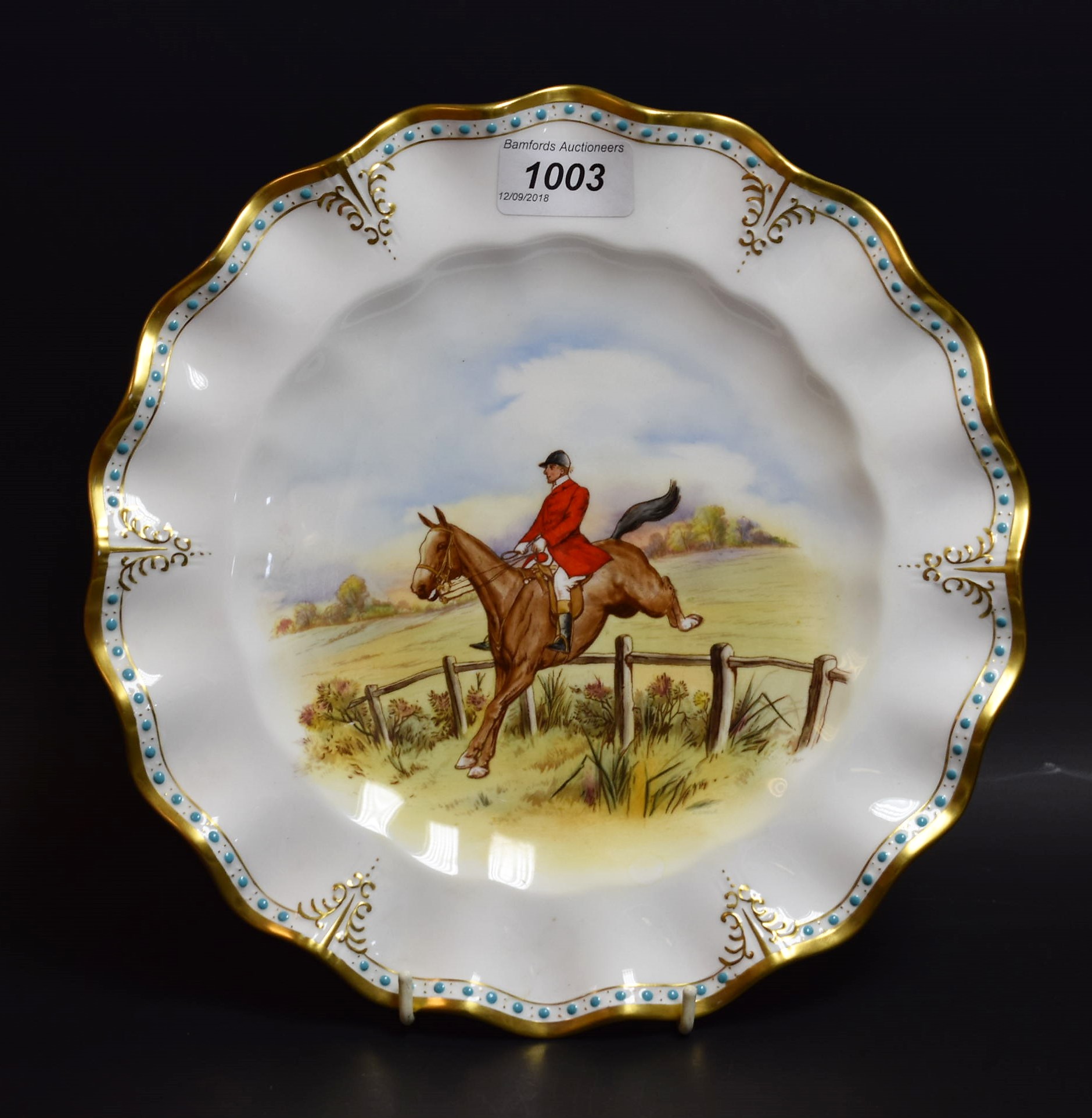 A Royal Crown Derby shaped circular plate,