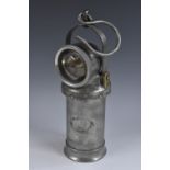 Mining - an early 20th century miner's lamp, arched handle, 6.5cm convex lens, 29.