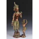 A large Thai/Sino-Tibetan copper and brass figure, of a Bodhisattva, standing in a lotus,