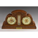 A Victorian oak desk top combination clock, thermometer and aneroid barometer, 8.