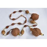 A Chinese nut and gourd missionary necklace, strung with alternating beads,