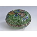 A Chinese plique-à-jour enamel bun-shaped box and cover, decorated with chrysanthemums and leaves,