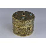 A 19th century brass travelling inkwell, hinged cover mounted with red and turquoise cabochons,