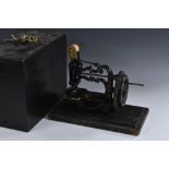 A Victorian cast iron manual patent sewing machine, by James G Weir, Soho,