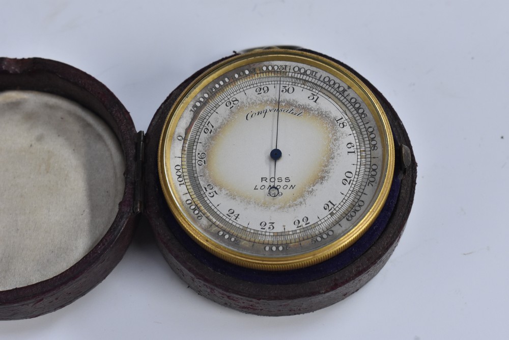 A 19th century lacquered brass travelling pocket barometer, 5cm silvered register inscribed Ross,