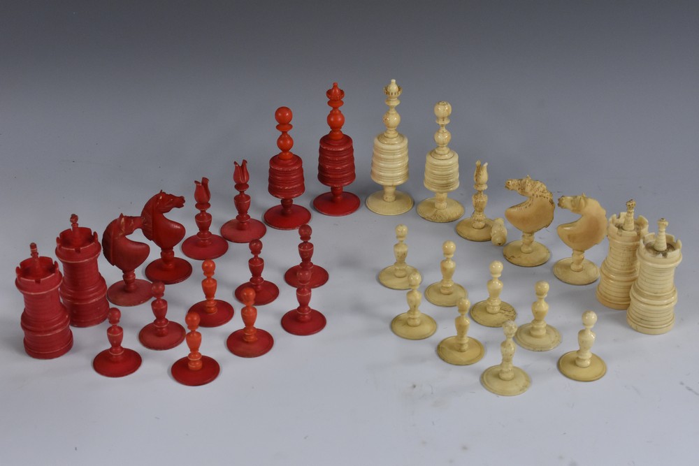 A 19th century bone Barleycorn pattern chess set, red stained opposition, the kings 9.5cm high, c.