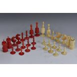 A 19th century bone Barleycorn pattern chess set, red stained opposition, the kings 9.5cm high, c.