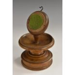 A 19th century turned hardwood pocket watch stand, 15cm high, c.