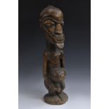 Tribal Art - an African fertility figure, 58cm high,