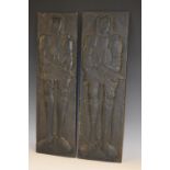 A pair of oak rectangular panels, carved after Medieval memorial brasses, 64cm x 20cm,