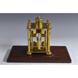 A brass and steel engineer's working model, vertical piston, mahogany base,