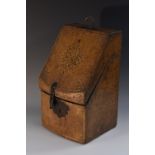 An 18th century tooled and gilt leather slope front box, now fitted for stationery,