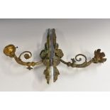 A pair of 19th century gilt-metal wall sconces, acanthus-grasped branches, flame finials,