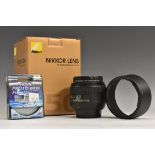 Photography - A Nikkor AF-S 50m f1.4 lens, soft case, manual,boxed; Hoya Pro1 digital UV filter.