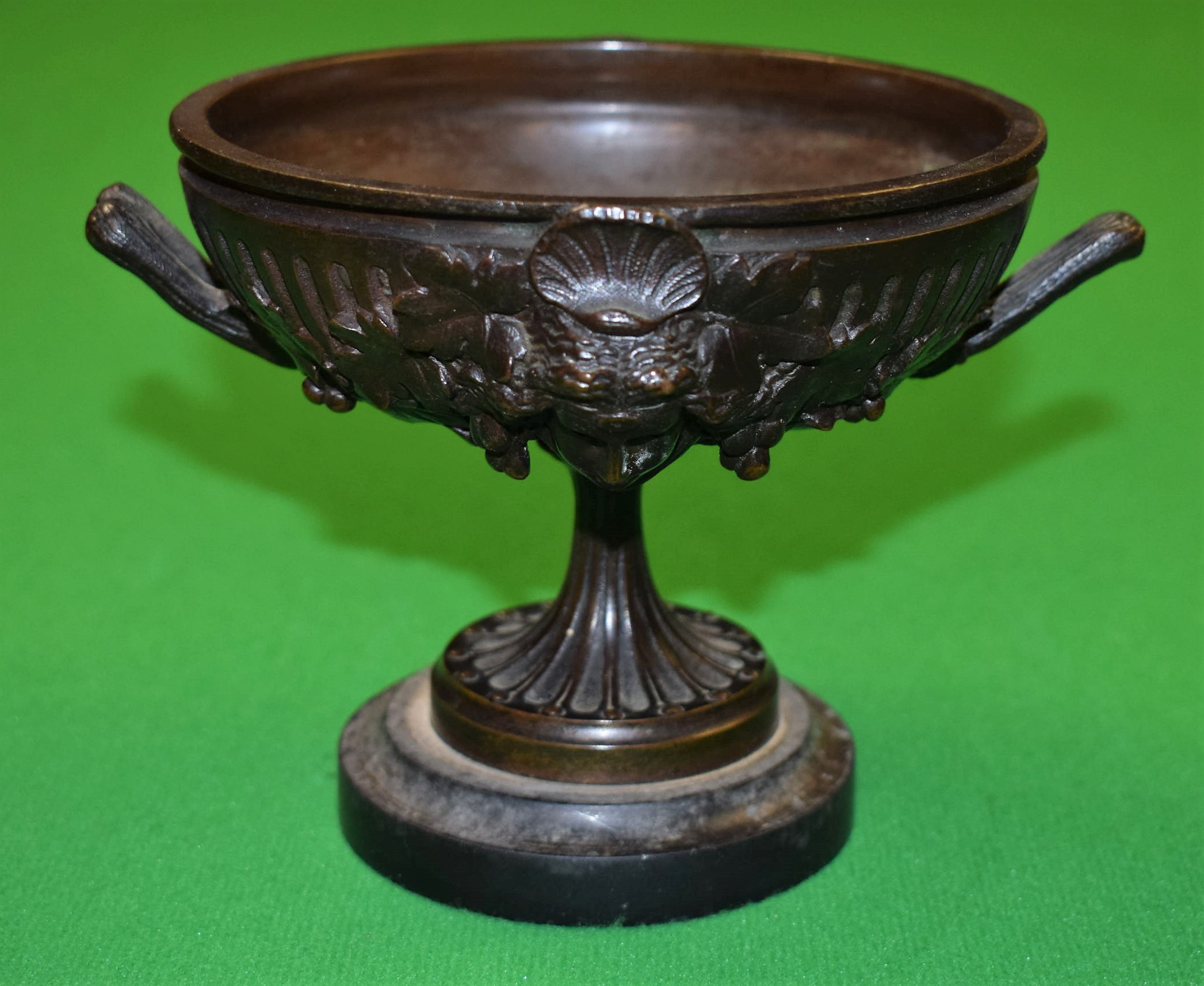 A 19th century French brown patinated bronze pedestal mantel urn,