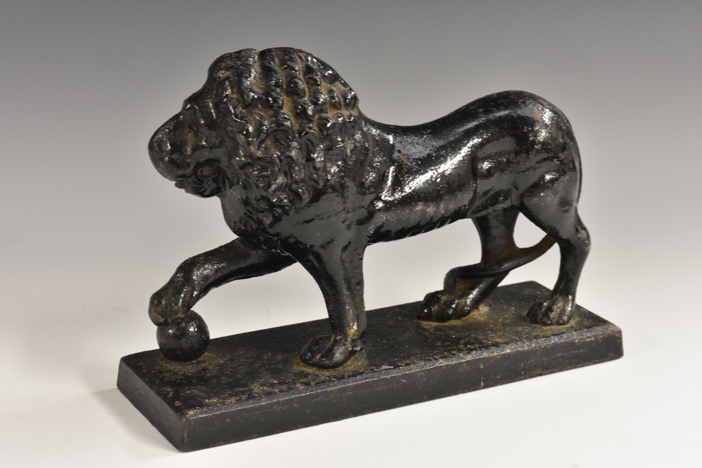 A 19th century cast iron door porter, as a Medici Lion, rectangular base, model no.