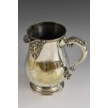 A George IV silver-plated baluster 'tavern' ale jug, Bacchic mask spout,