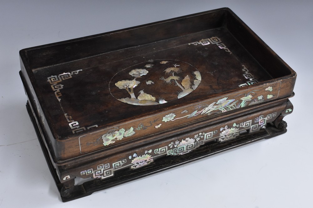 A 19th century Chinese hardwood and mother-of-pearl marquetry rounded rectangular opium tray,