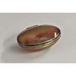 An 18th century silver mounted agate snuff or spice box, stand-away hinged cover,