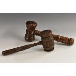 Treen - a late Victorian turned oak gavel, 27cm long, c.1900; another, Black Forest type, 25.